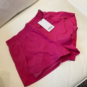 Pink girlfriend collective shorts